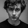 Timothée Chalamet's Close-Up Face Headshot Portrait Celebrity Photo